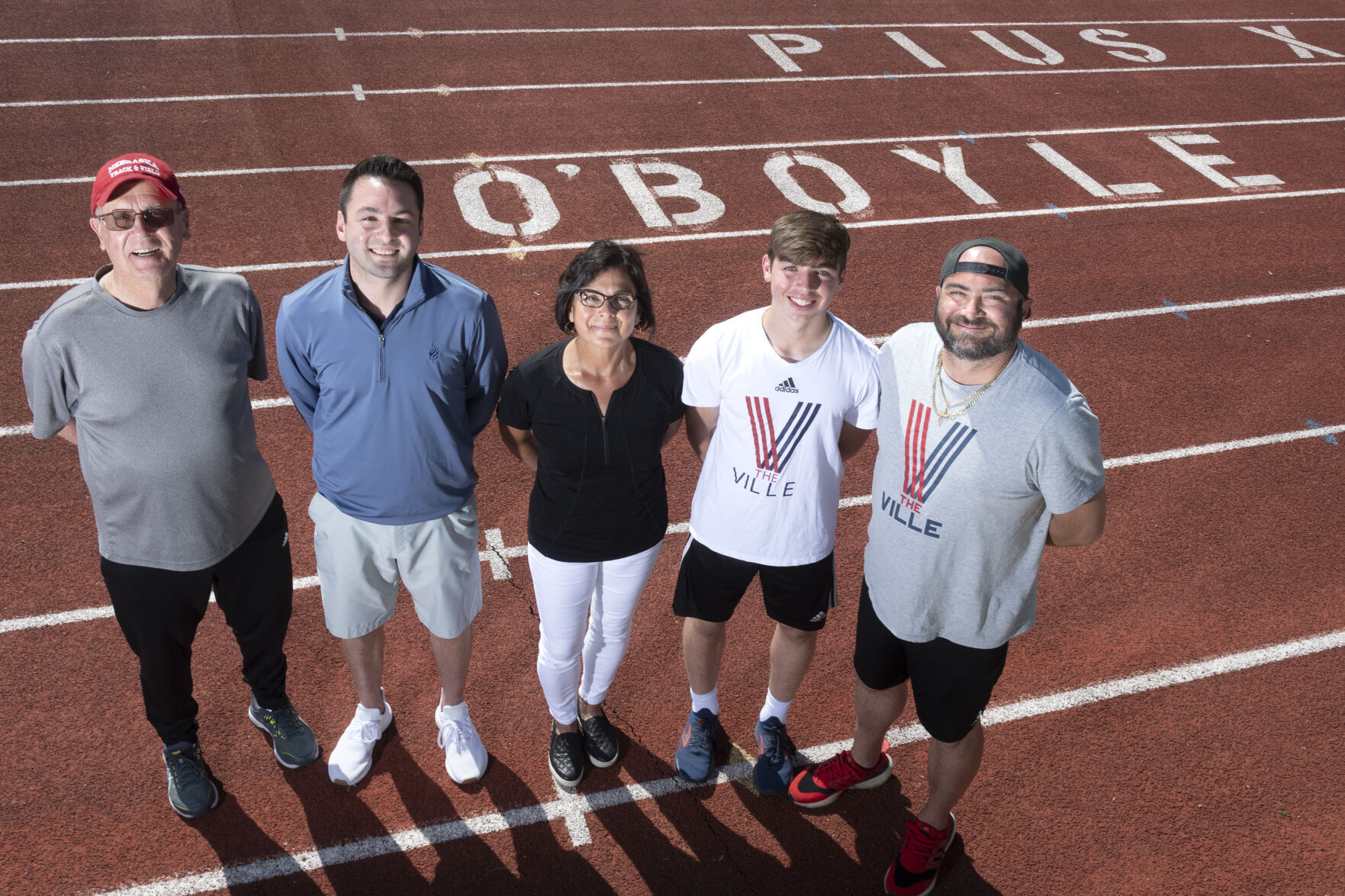 Pius X track and field family, 5.13